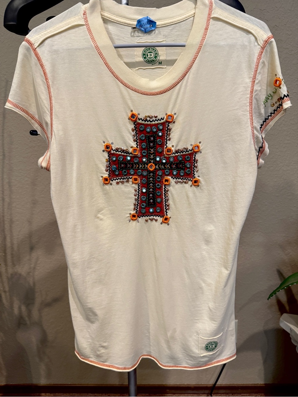 Double D Ranch Cream Short Sleeve Tee with Multi Colored Embellished Cross